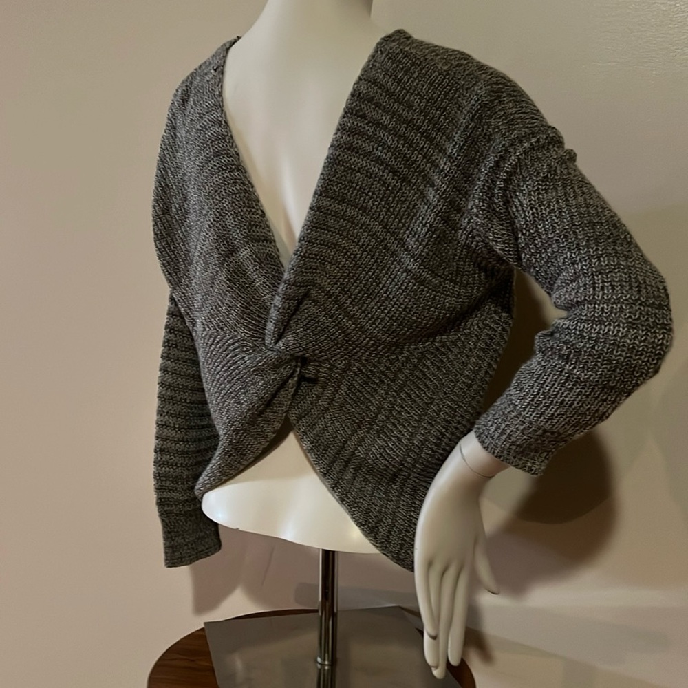 Absolutely creative worldwide sweater partial open back detail